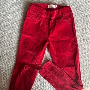 Mini Boden red cord pants with elastic waist.
